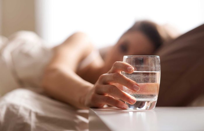 glass of water next to bed