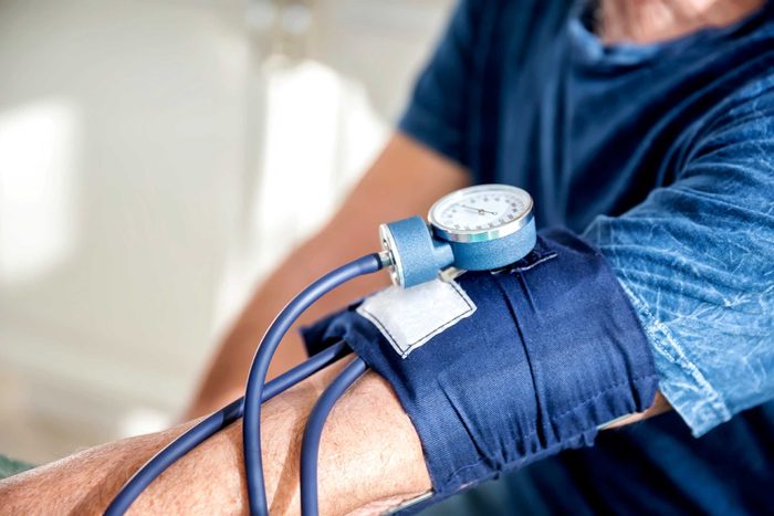 man getting his blood pressure taken