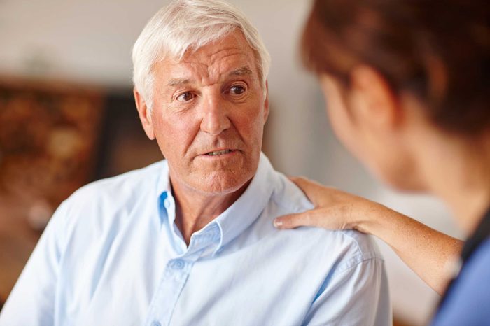 older man talking to his doctor