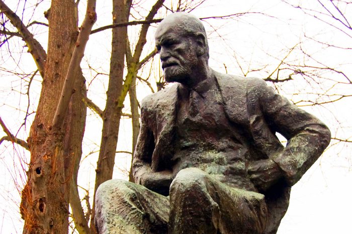 Statue of a man in a park.
