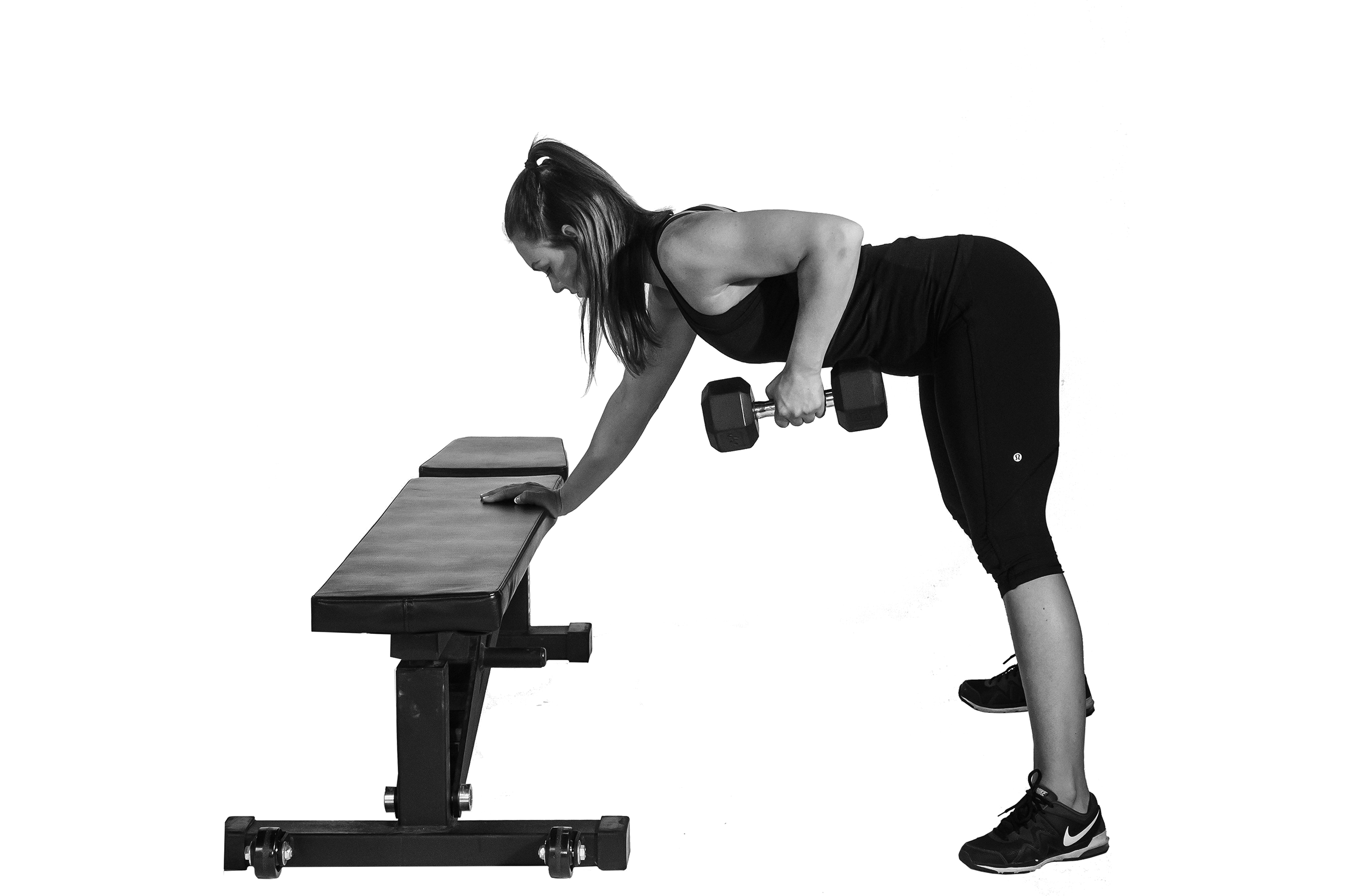 Woman doing 3-point dumbbell row.