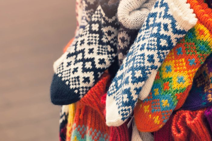 collection of knitted wool gloves