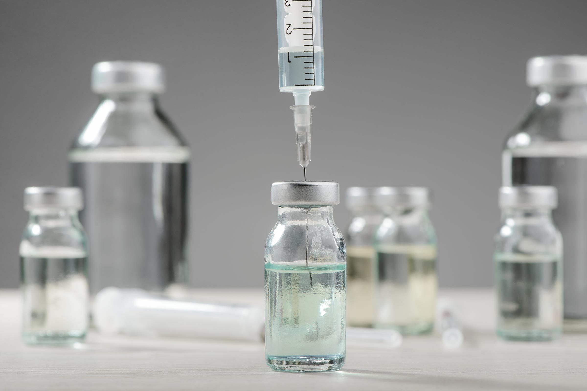 insulin injection: needle in a bottle
