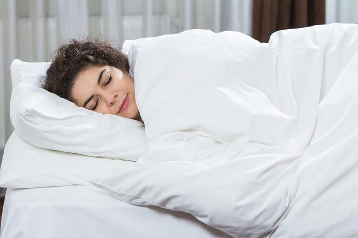 woman sleeping in bed