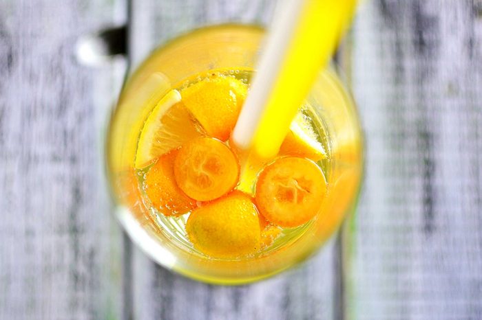 Closeup of a beverage and straw.