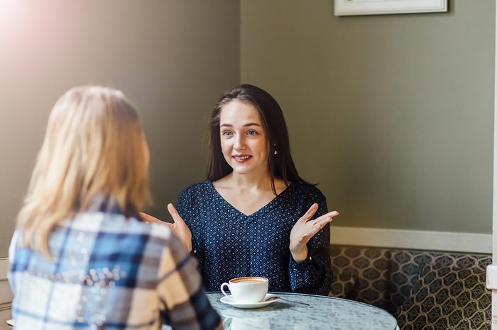 friends having a conversation in a coffee shop