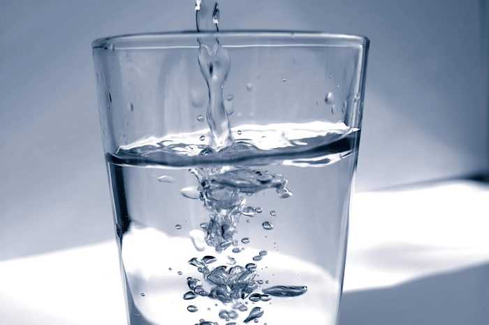 Water pouring into a glass