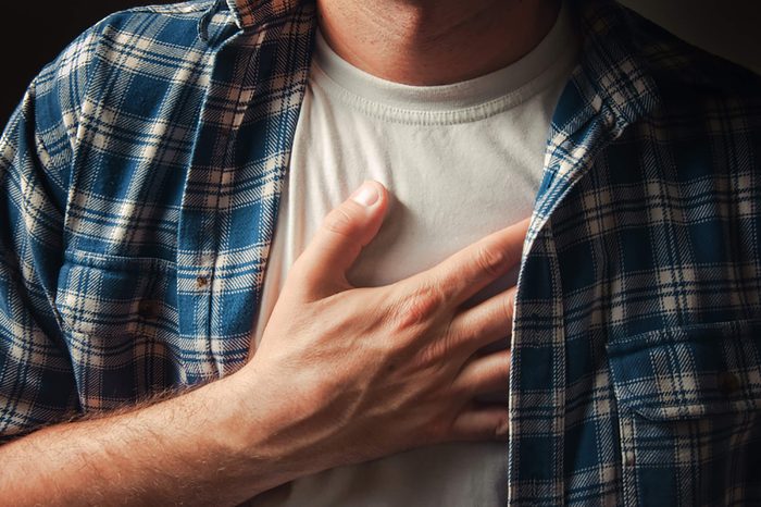 Man-holding-his-chest