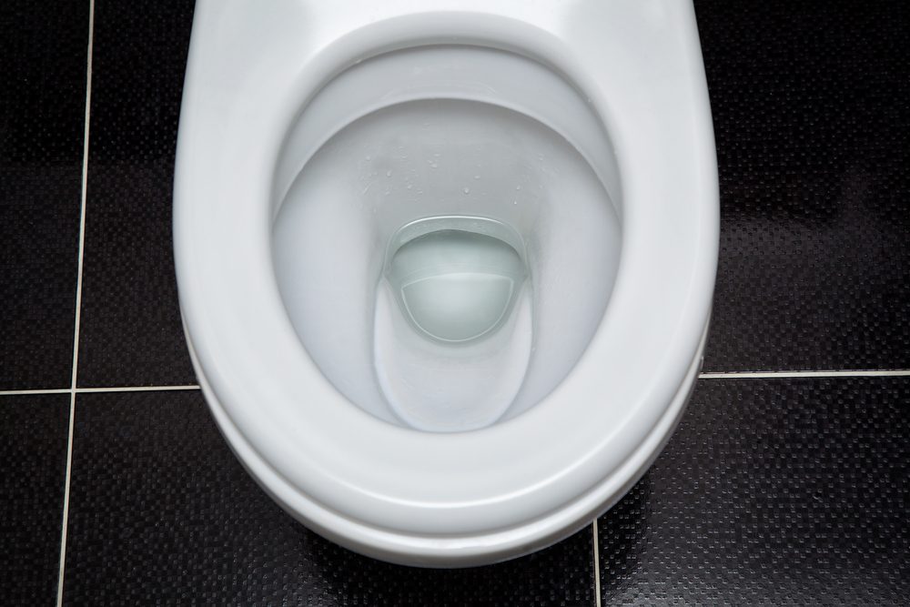 looking into toilet bowl