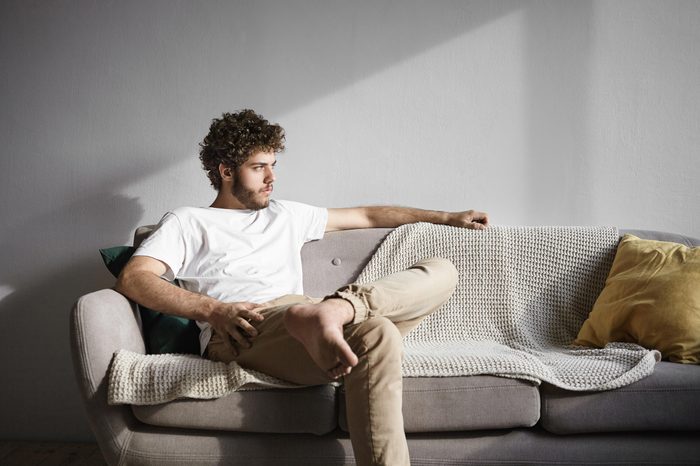 sad man couch depressed