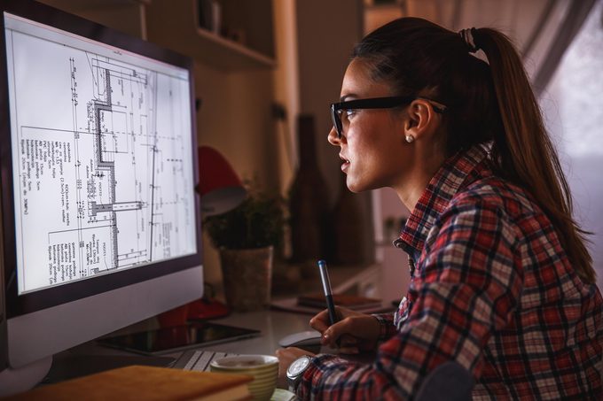 woman work late night computer