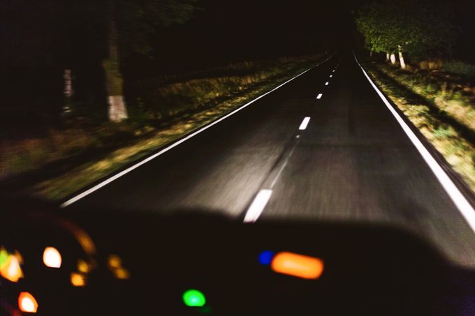 Fast night driving, view from inside of a car 