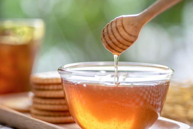 honey dipper in honey