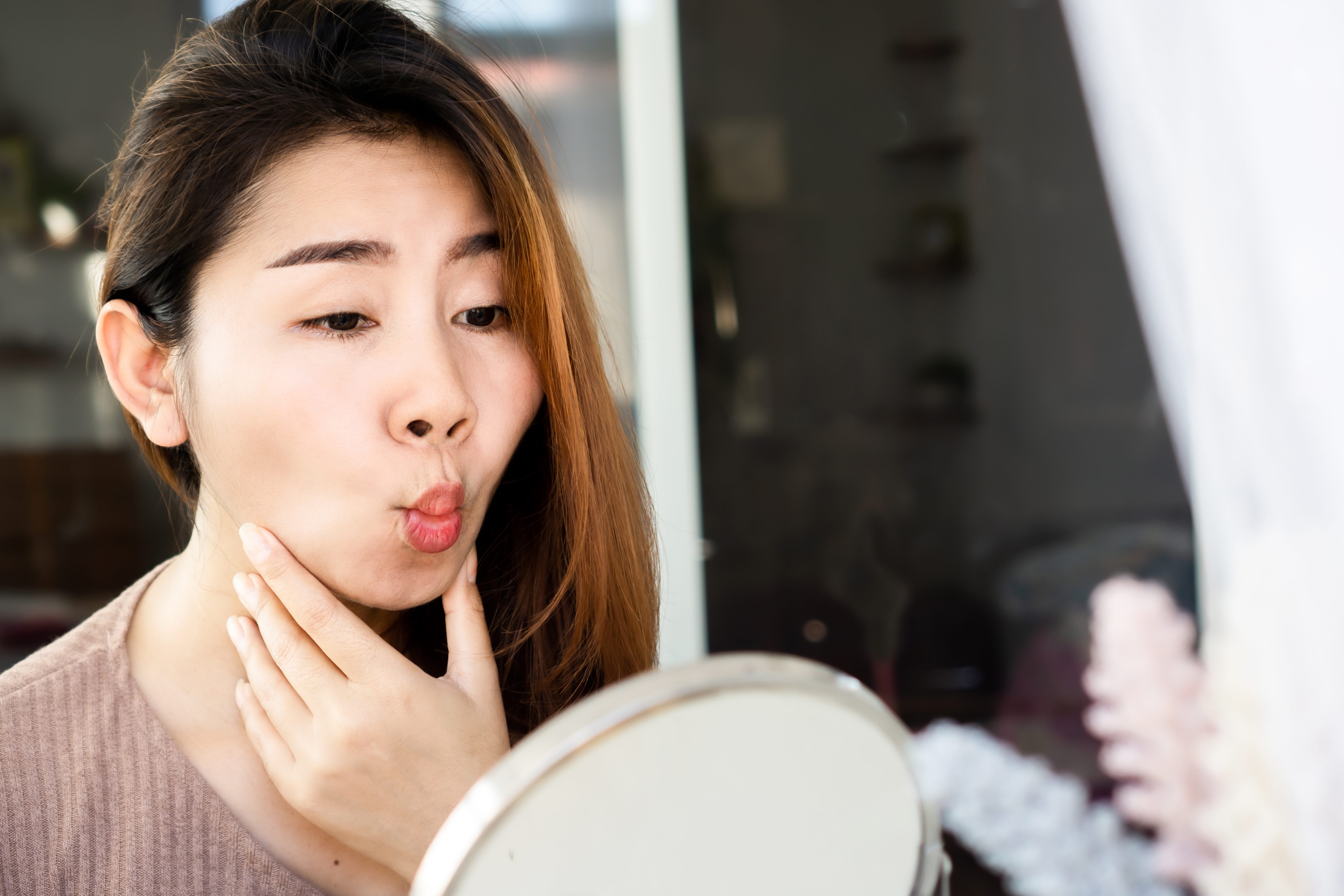 Asian Woman Doing Face Yoga , Exercises For Anti Aging, Slimming Face
